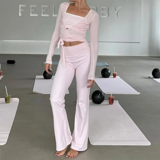 Women’s yoga workout set with slim-fit crop top and matching fitness leggings