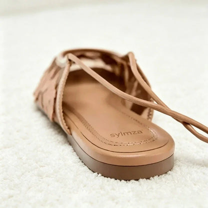 Women’s mesh ballet flats with embroidered floral design and breathable hollow detailing
